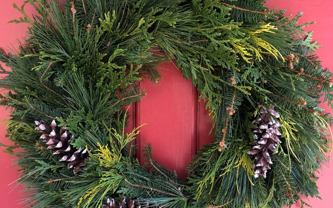 Natural wreath on a red door
