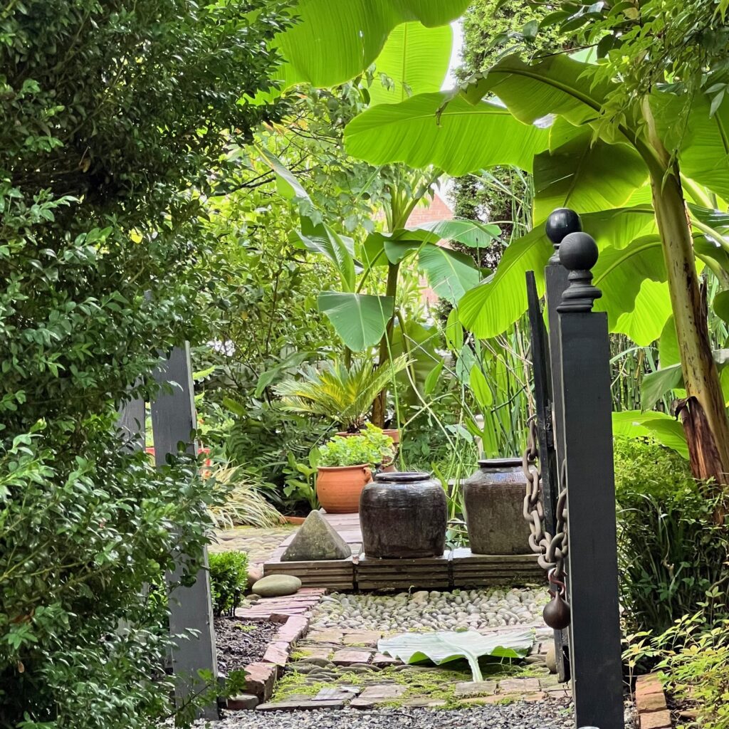 Joel Cole Garden Gate looking towards water garden